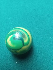 bouncy ball  bigger than the small ball from vending machine. Not a super bal