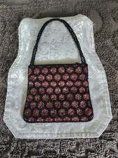 Black and red beaded purse. Very nice.