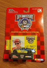 16 TED MUSGRAVE - PRIMESTAR FORD TAURUS - 1998 RACING CHAMPIONS 1:64 CAR w/CARD