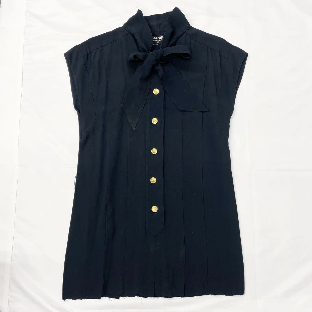 Autentico abito CHANEL pezzo unico bottoni cocco senza maniche papillon blu navy di JP