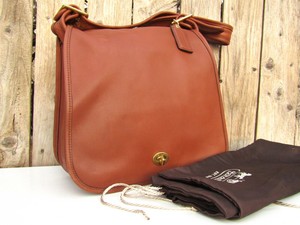 how can i tell if my coach bolsa is real