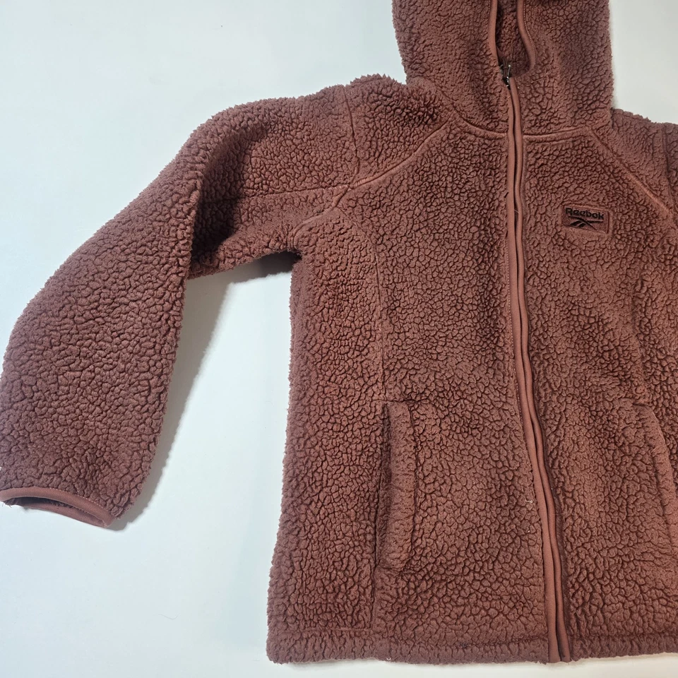 Chaqueta de escalada Reebok Double Monkey Sherpa manga niños mediana terracota con capucha Foto 2 de 4