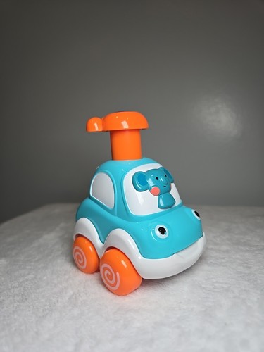 Silly Racers from The Manhattan Toy CompanyPush & Go Car Blue White Orange
