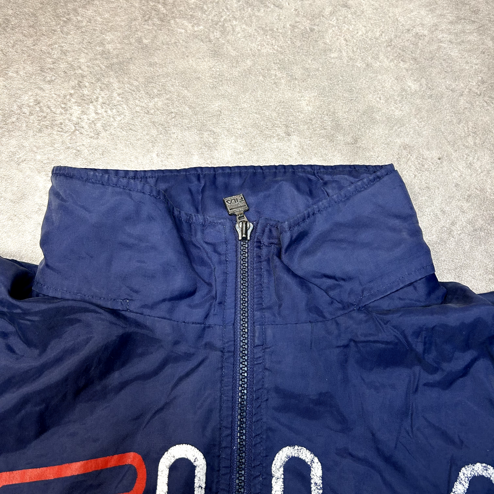 Giacca a vento Fila Track uomo media vintage full zip foderata in rete blu navy