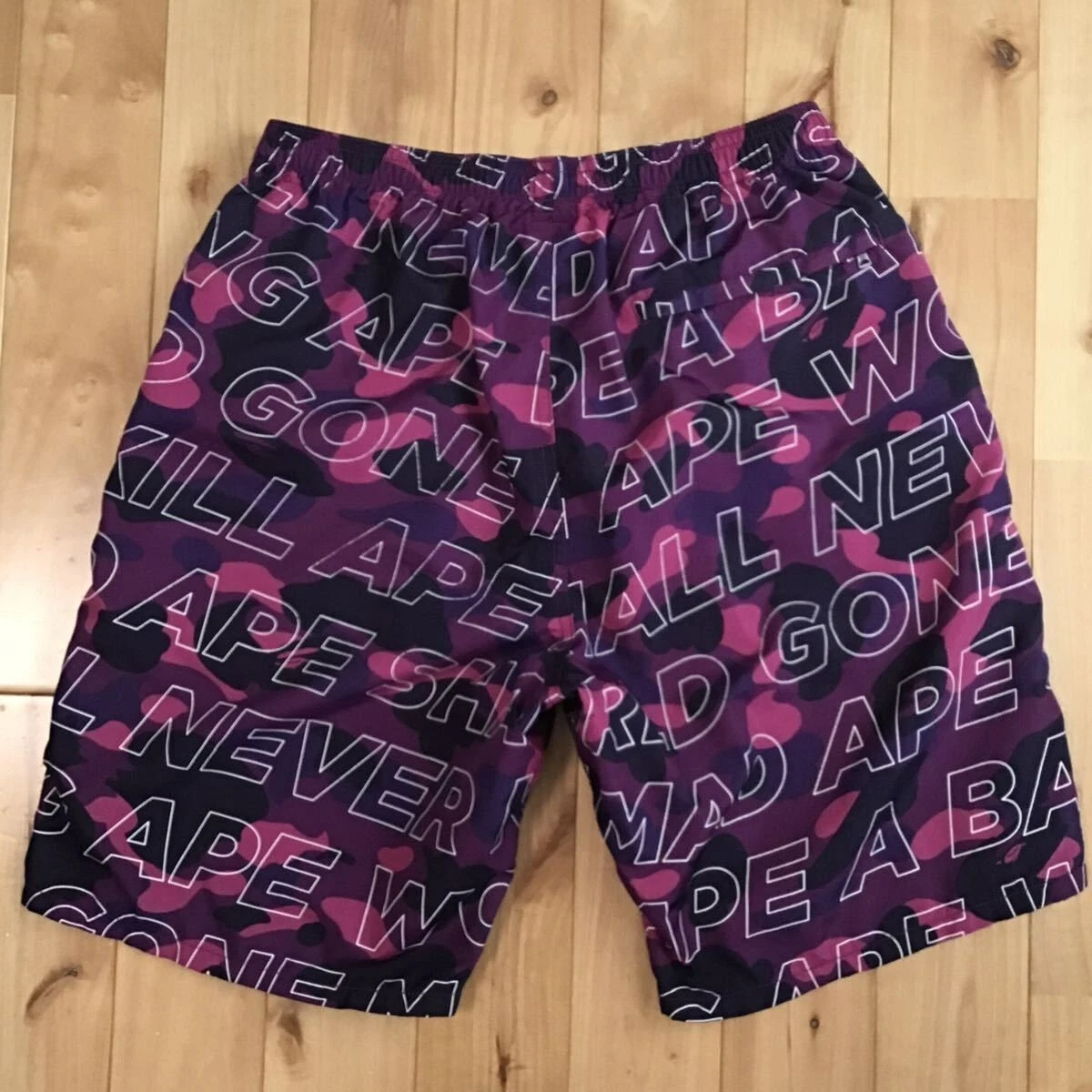 Bape purple cheap camo shorts