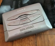 VinTagE SONY WALKMAN WM-EX570 TAPE CASSETTE PLAYER SILVER METAL for PARTS REPAIR