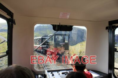 PHOTO  TRAINS PASSING ON THE SMR THE ASCENDING DIESEL TRAIN ON THE SNOWDON MOUNT
