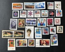 Lot de 30 timbres des USA années diverses - encore sur fragment - E100