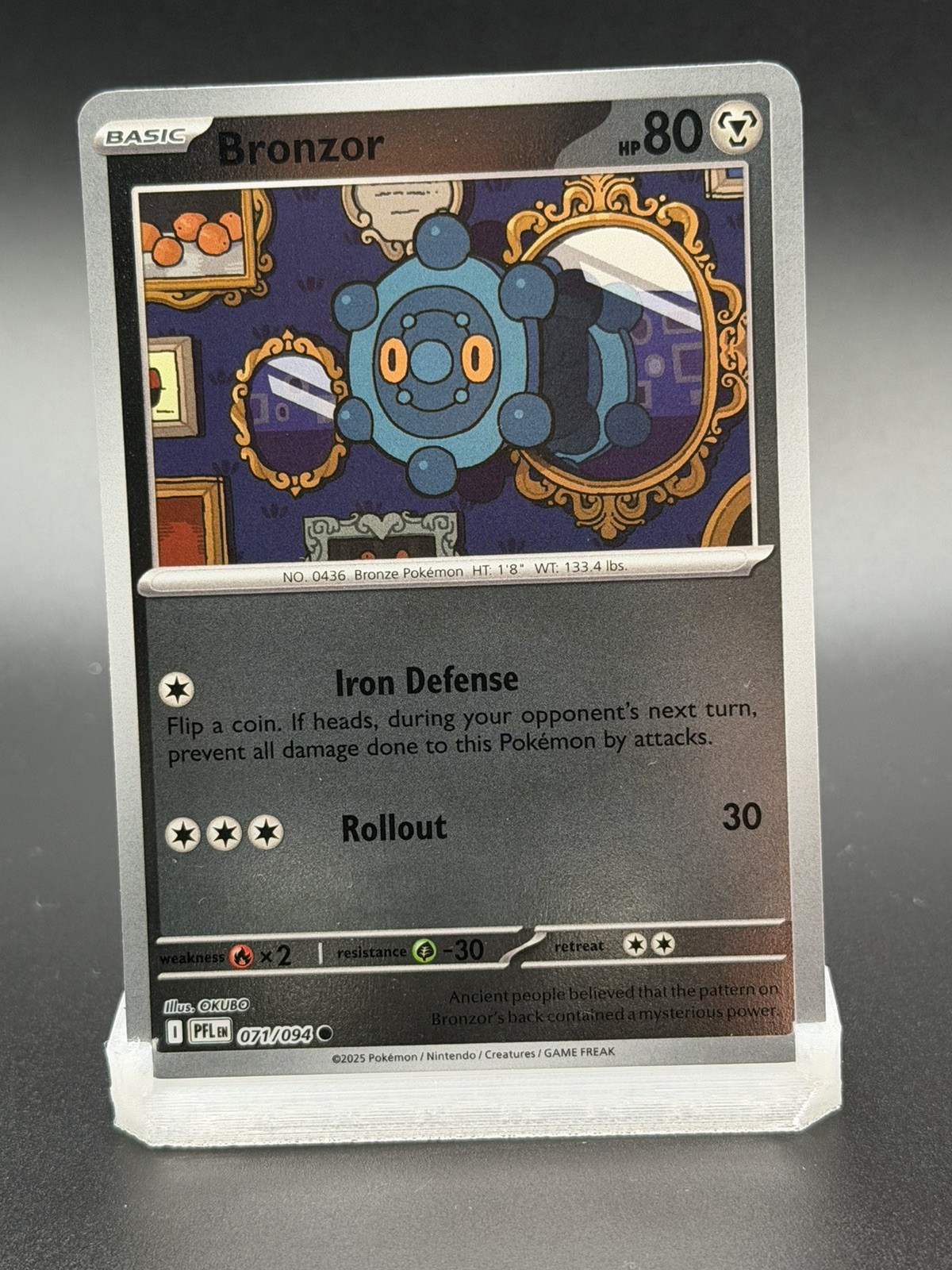 Bronzor 71/94 - Reverse Holofoil NM - ME: Phantasmal Flames - Pokémon TCG