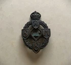 Rare Double Pin WW1 Royal Electrical & Mechanical Engineers (REME) Cap Badge
