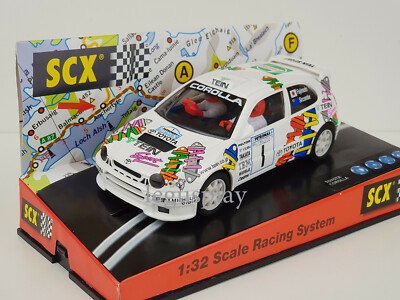 Slot Car Scalextric SCX 60340 Toyota Corolla ''Tein Sport'' Fujimoto/Sircombe #1