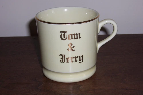 Hall China - Tom & Jerry - Ivory Color Coffee Cup w/ Gold Trim - Hairline
