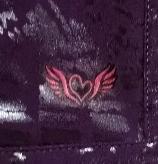 Exfoliante Smitten Statement XS Púrpura Iridiscente Estampado de Guepardo Talla XSM. Usado en excelente estado Foto 2 de 4