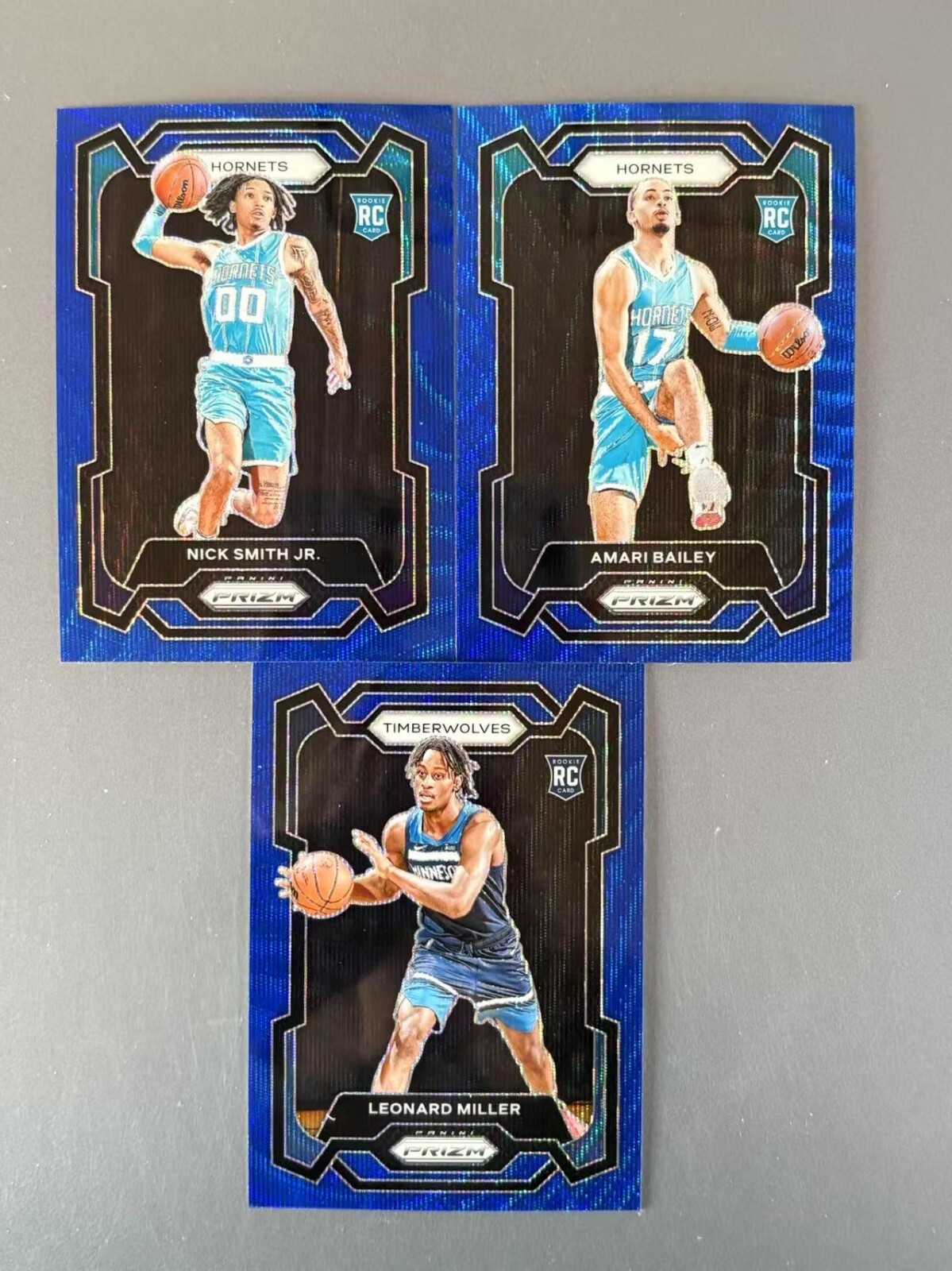 Nick Smith Jr 2023-24 Panini Prizm International Blue Wave Prizm RC #135