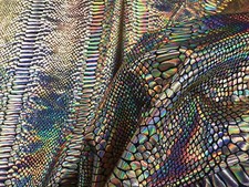 GOLD IRIDESCENT SNAKE SKIN PRINT ON A NYLON 2 WAY STRETCH SPANDEX-SOLD BY YARD.
