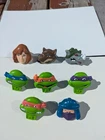 Eight Vintage TMNT Nabisco Shreddies Cereal Premium Rings