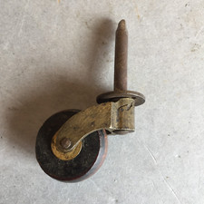 LATE 19th. CENTURY FRENCH CASTOR WOOD WHEEL AND BRASS MOUNT.