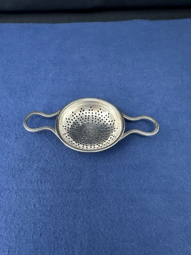 INTERNATIONAL SILVER COMPANY STERLING TEA STRAINER