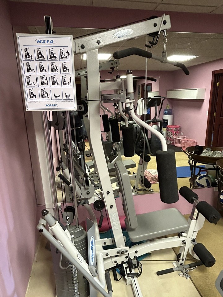 Hoist H310 exercise equipment cable machine with side leg press, never