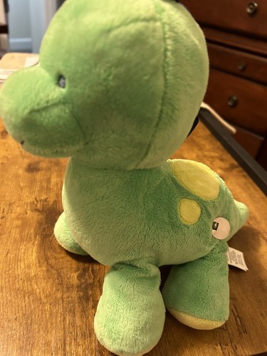 Peluche dinosauro chiavi in mano musicale verde - Foto 8 di 8