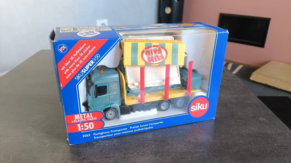 SIKU, MAN 8x4 avec remorque 3 essieux et Yacht et personnages, échelle