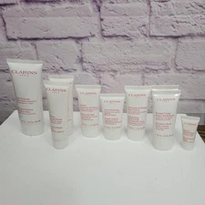 NEW Lot x9 Clarins Gift Pack Lotions Scrubs Creams Balms