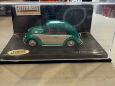 VOLKSWAGEN BUG   GREEN MADE BY VITESSE TOYS 1.43 SCALE IN THE BOX.
