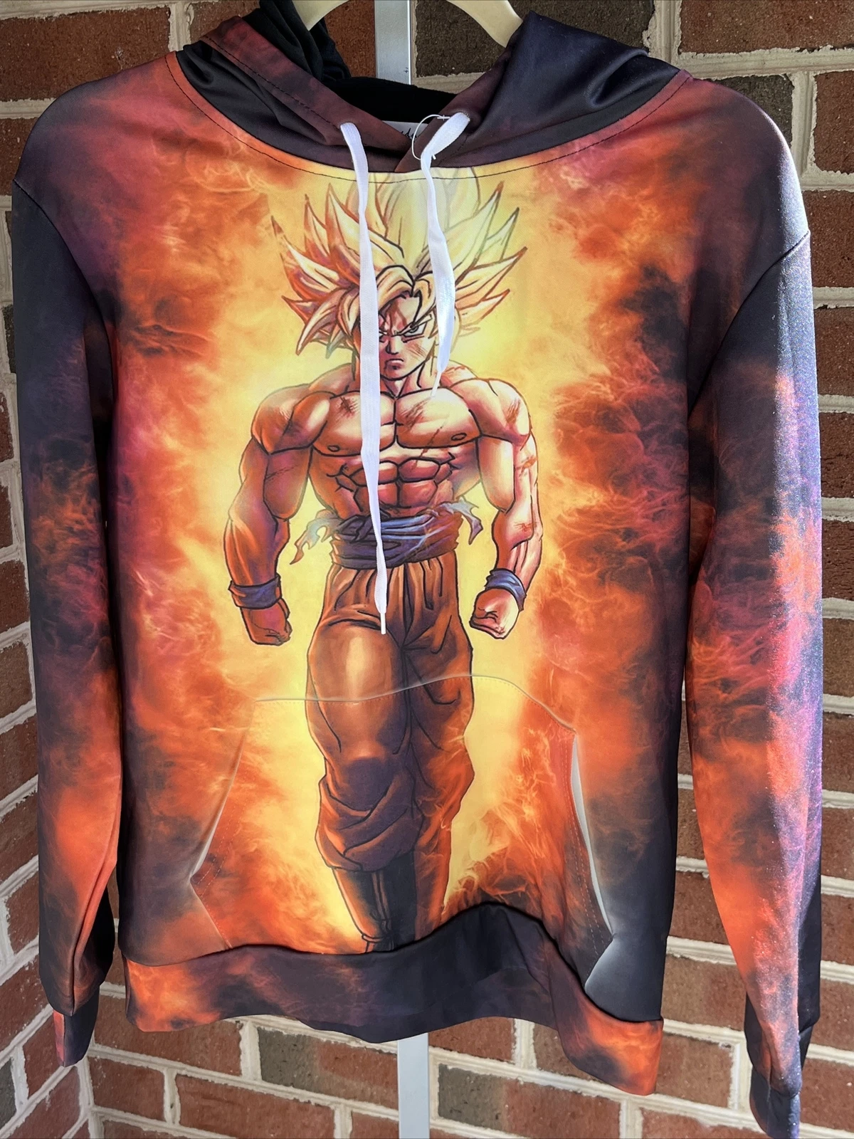 Sweat à capuche Dragonball Supreme Kid Goku taille SM manches longues imprimé intégral