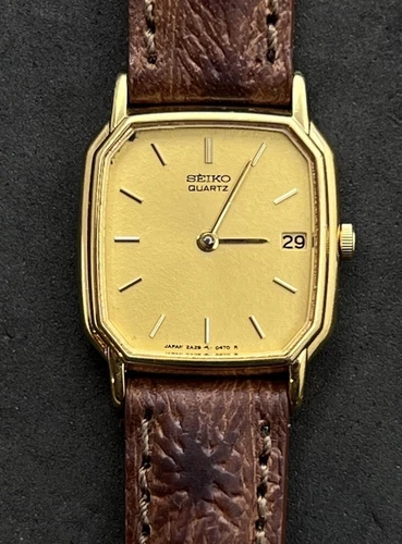 Vintage New 1986 SEIKO Tank Women’s 25mm Slim Quartz Watch Date Gold Case Dial