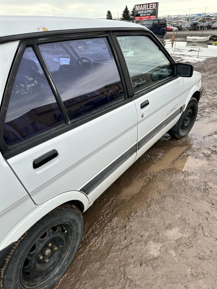 Pinza de freno de disco delantera izquierda usada se adapta a: 1990 Subaru Justy delantero GL delantero izquierdo G Foto 3 de 4
