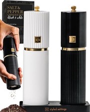 White and black salt and pepper grinder set with gold trim - set of two