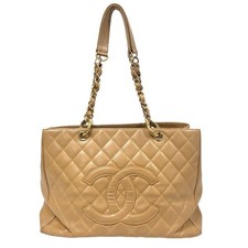 Borsa tote CHANEL GST in pelle di caviale con catena in pelle, beige dal Giap...