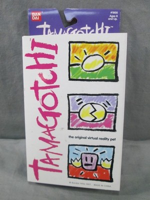 Tamagotchi THE VIRTUAL REALITY PET Bandai OPEN BOX 1997 Turquoise