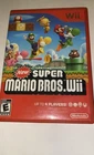 New Super Mario Bros. Wii - Nintendo Wii - Complete with Case and Manual - 2009
