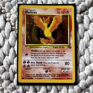 1995 moltres pokemon card value Fossil Holo #12 CGC 7.5 (Mislabeled When Rockets Moltres is Knocked Out first edition 1995 holo moltres