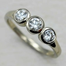 Bezel Set Round Cut Moissanite Three Stone Engagement Ring 14k White Gold Plated