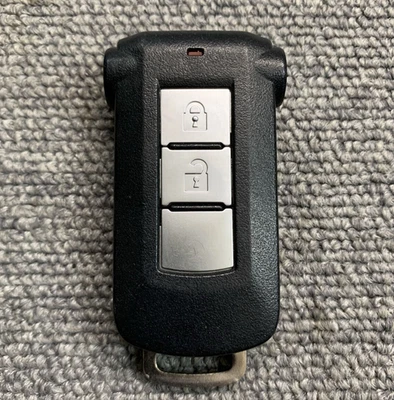Original Mitsubishi Smart Key 2 botones Keyless Fob RHD JDM OEM 007-AF0128 - Imagen 1 de 4