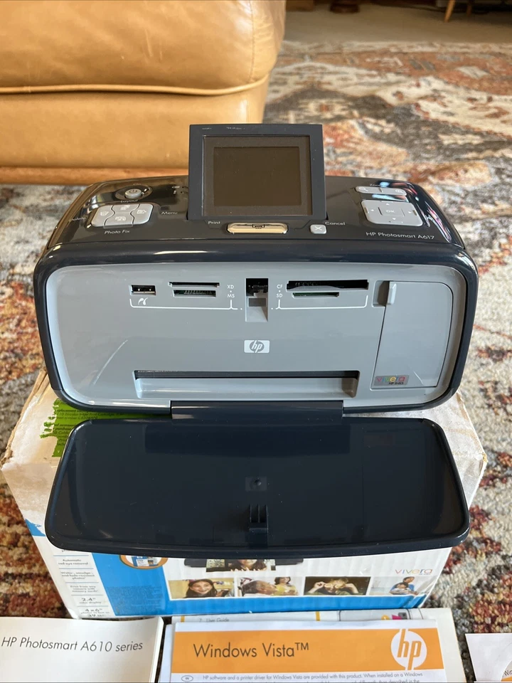 Impresora fotográfica compacta HP Photosmart A617 5X7" caja de papel fotográfico y manuales Foto 3 de 4