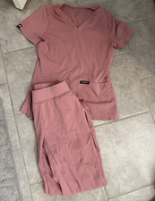 Jaanuu Women s Pink Solid Scrub Set V-Neck Top Jogger Pants Size XXS