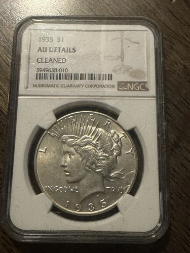 1935 Peace Silver Dollar $1 NGC AU Details Cleaned