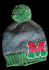 Kids pompom knitted green and gray cap with letter M warm fur inside