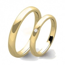 Coppia di fedi in oro giallo 9 carati con diamante. Fedi nuziali economiche 