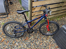 Carrera 20in Unisex Kids Mountain Bike Blue/Red Front Sus V-Brakes 7 speed