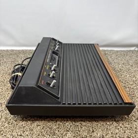 Atari 2600 System Bundle with Console, 30 Games, Joystick, Paddles, and More LOT