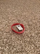 POWER BALANCE RED RUBBER BRACELET BRAND NEW IN PACKAGE VERY NICE