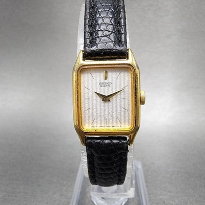 Seiko Tank Watch Women 17mm Silver Dial Gold Tone Rectangle 4N00