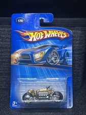 2005 HOT WHEELS #176 GOLD DODGE TOMAHAWK MOTORCYCLE H9084