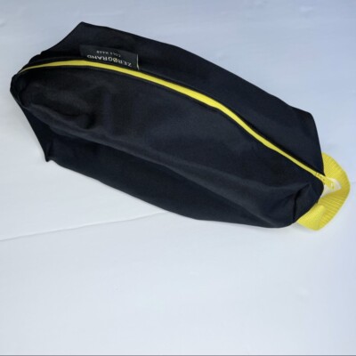 Cole Haan zero grand black and yellow travel pouch / cosmetics case with zipper