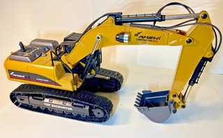 RC Bagger Amewi 22309 im Maßstab 1:14 Vollmetall Effekte gelb wie neu