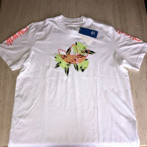 black and lime green adidas shirts